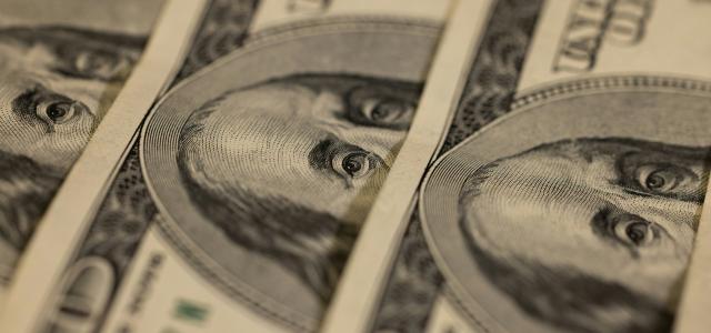 a close up of a bunch of money by engin akyurt courtesy of Unsplash.